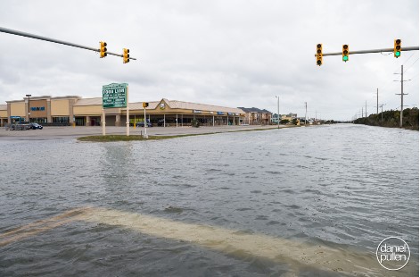 Avon Food Lion parking lot flooded from breach during hurricane.