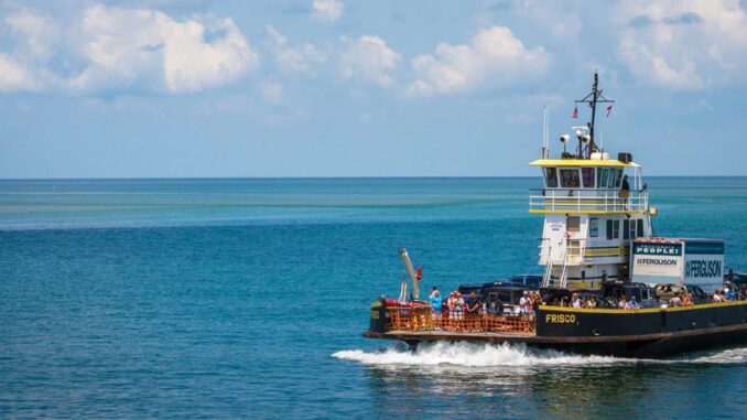 An NCDOT ferry is en route across the Hatteras Inlet that separates Hatteras Island from Ocracoke Island. 