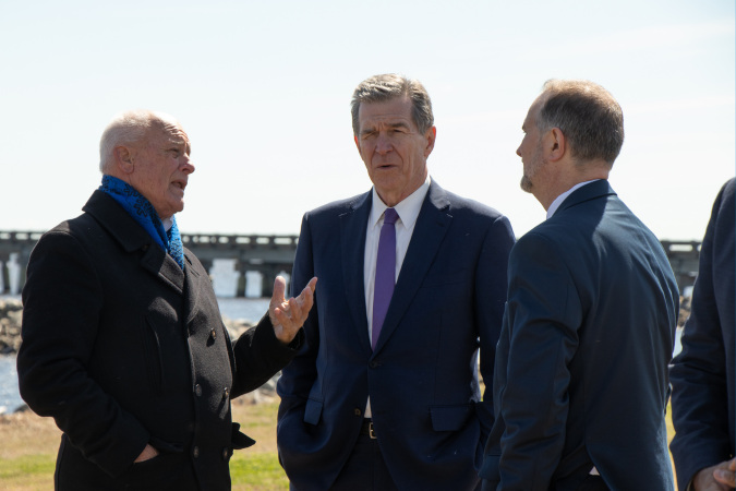 Governor Cooper speaking with Governor Cooper and NCDOT Secretary Eric Boyette