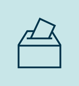 Graphic of a ballot going in a box.